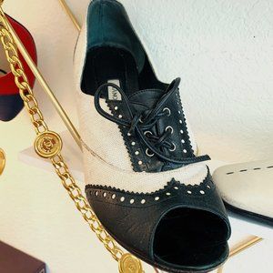 Manolo Blahnik Spectator Peep toe Pumps